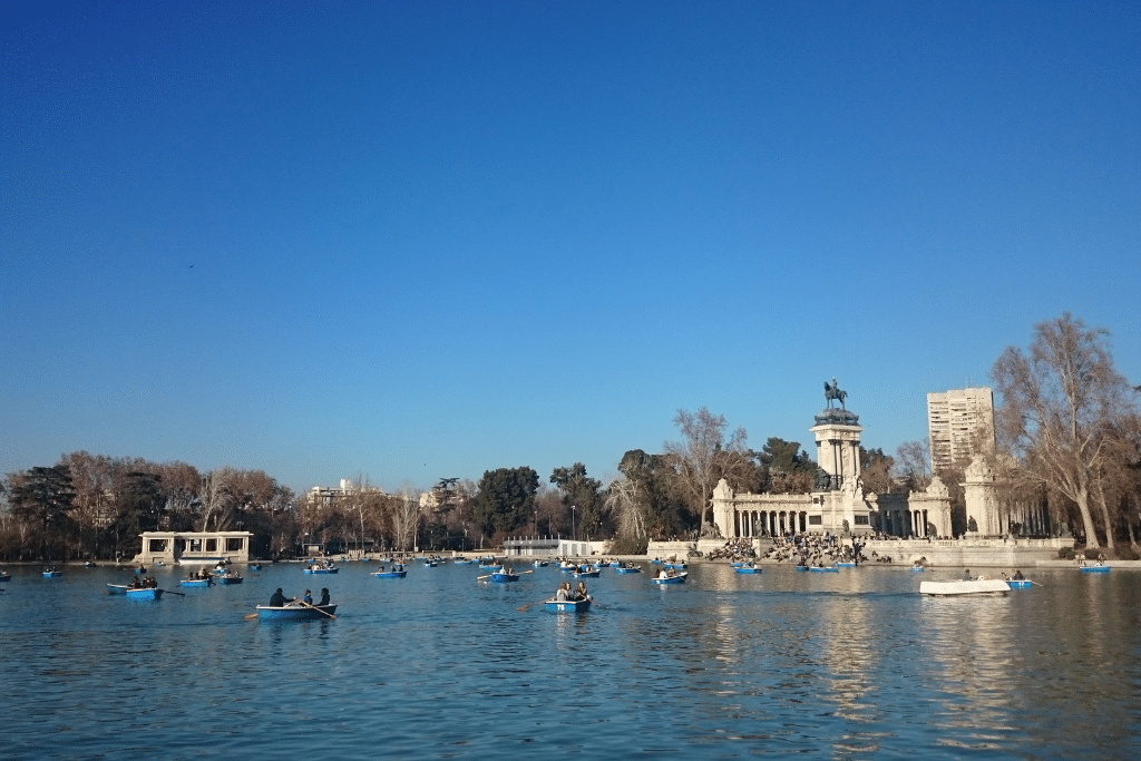 The man-made lake where you can go for a boat ride in El Retiro Park, Madrid.