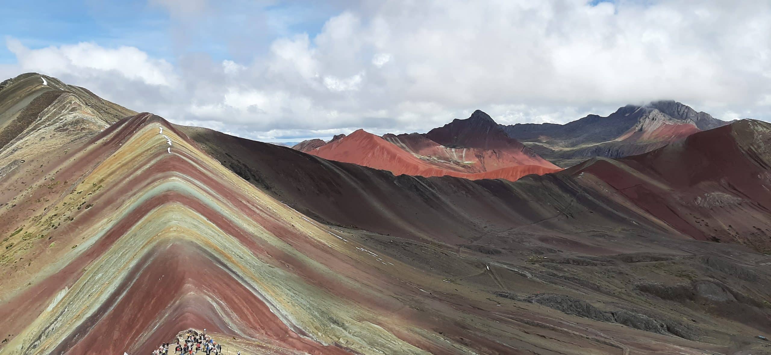 Is Rainbow Mountain worth it? Just one look at this photo tells you the answer!
