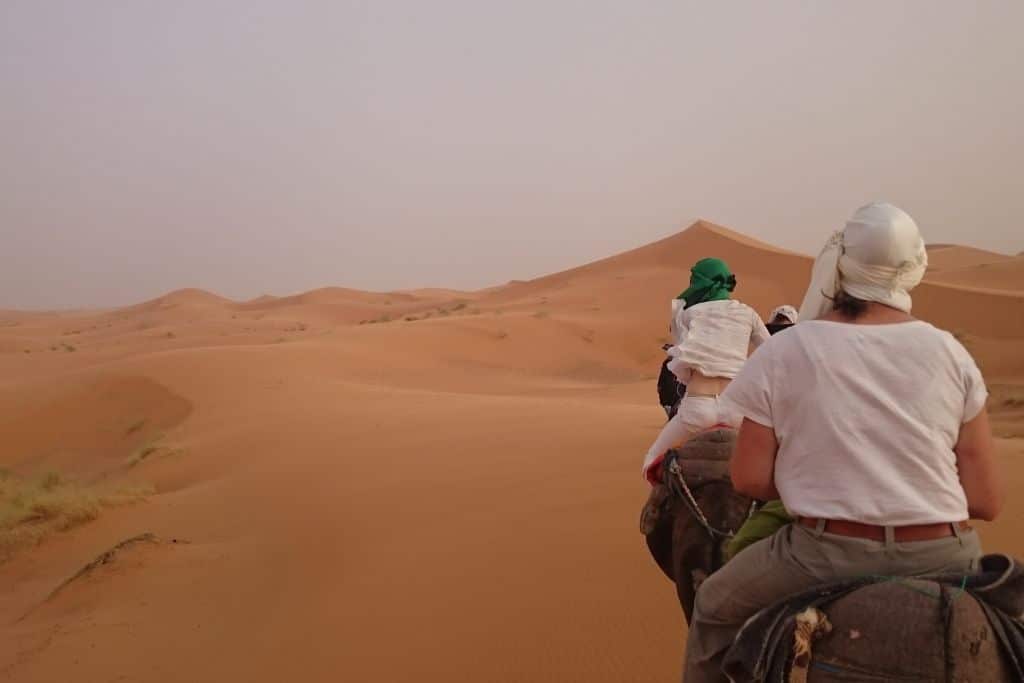 On a camel ride in the Sahara Desert - an absolute must-do activity from Marrakesh. 