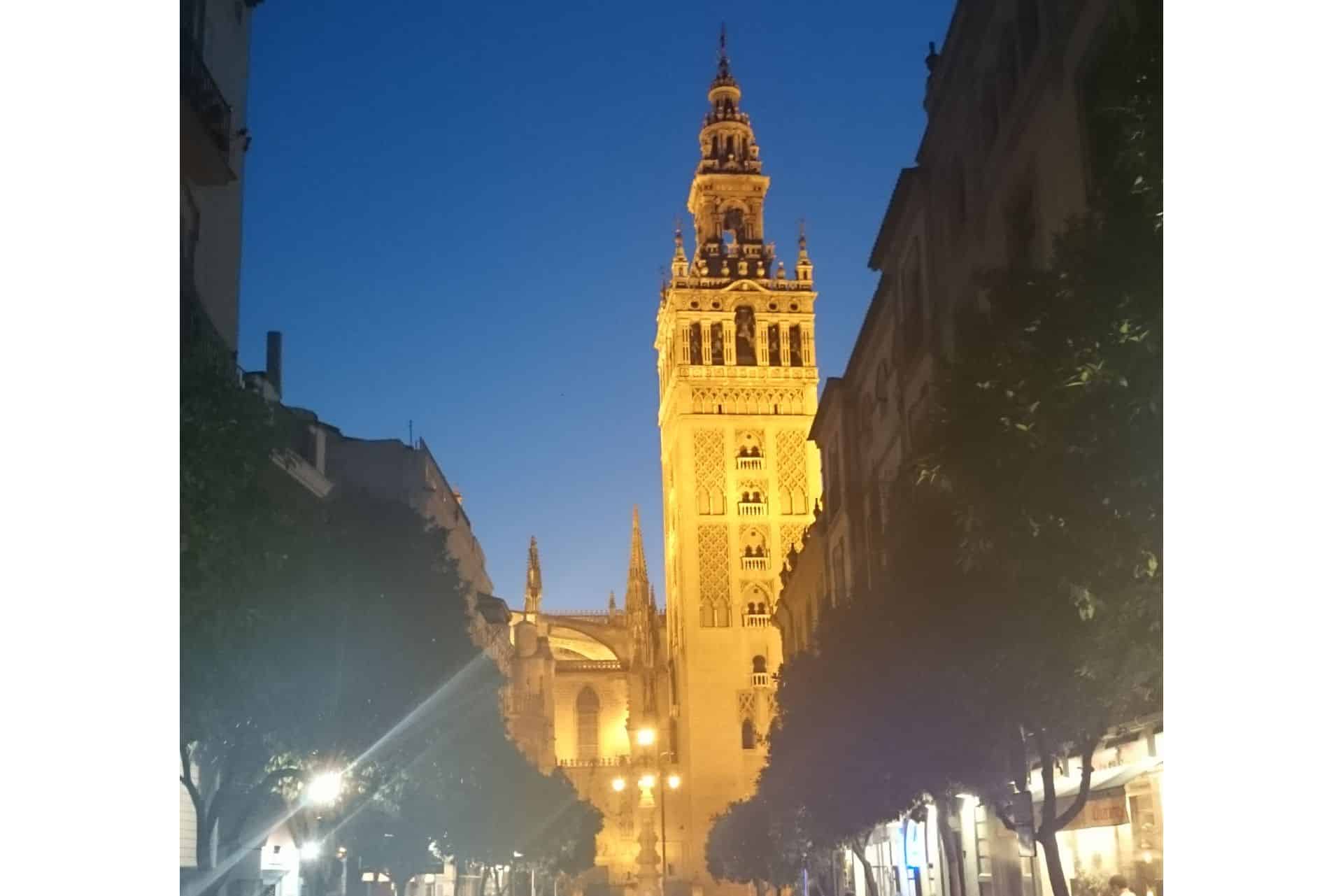La Giralda Bell Tower lit up at night.